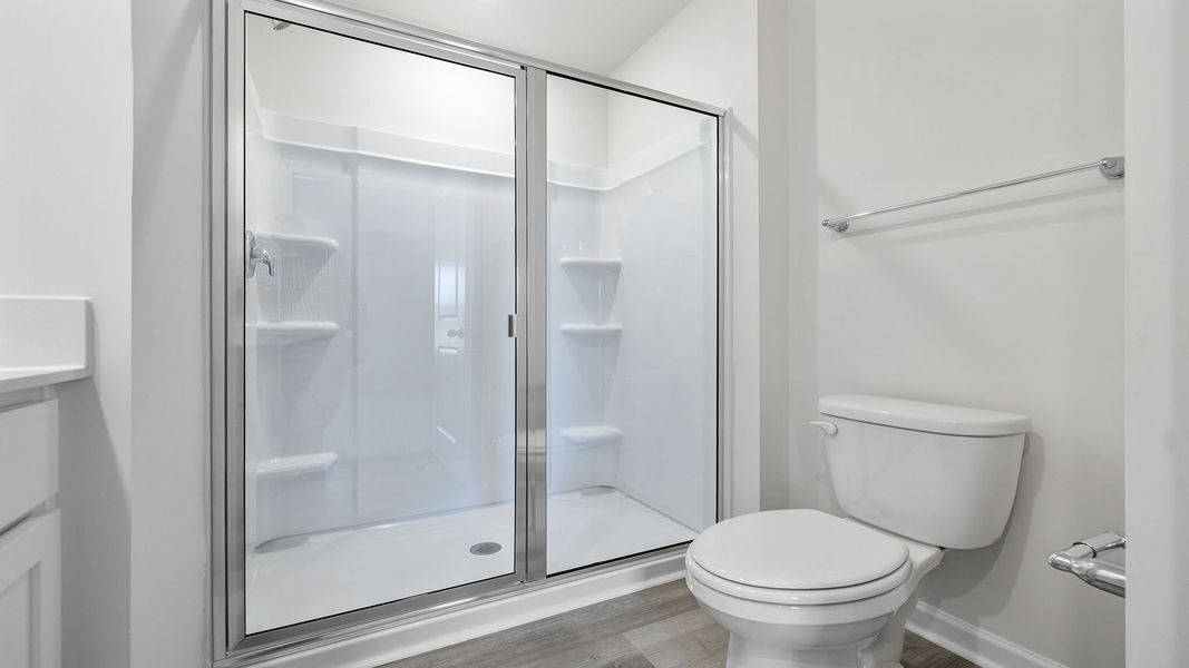 Furnished interior view inside a new home in Village Grove, Greenville (Image 13).