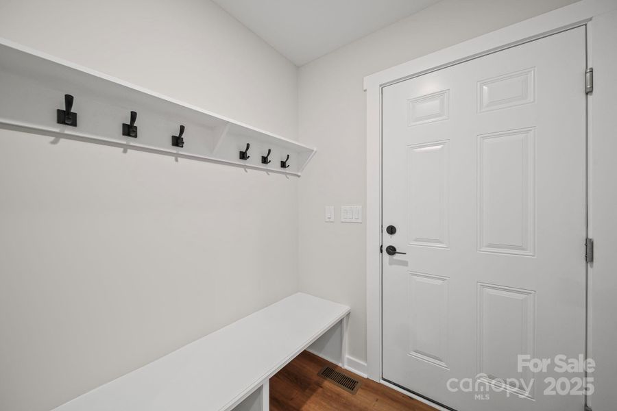 Drop zone from garage entry door. Drop zone from garage entry door.