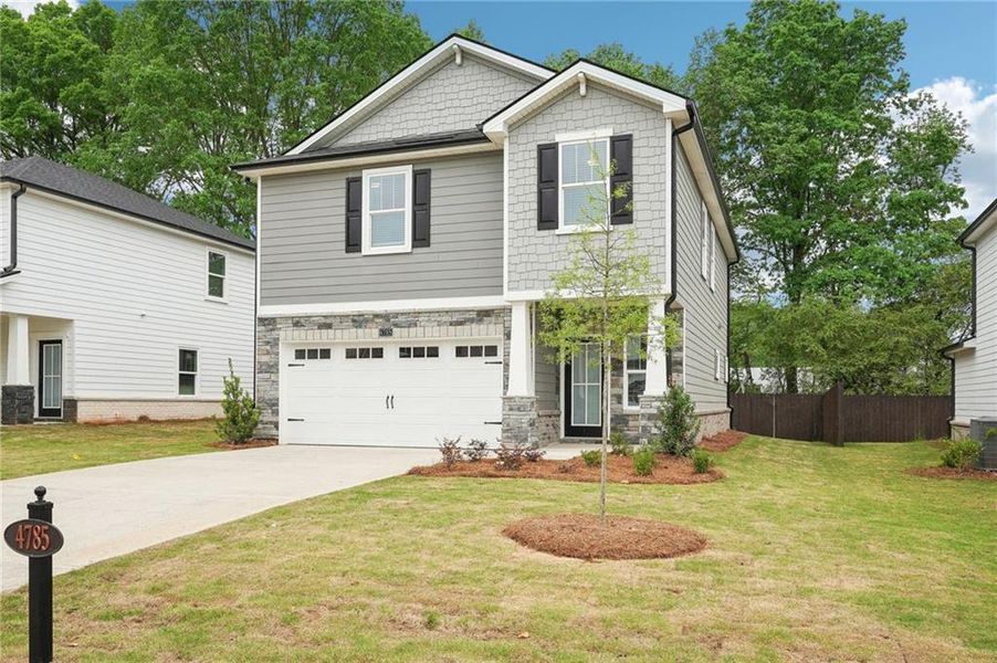 Front exterior of a new home in Hemingway - Reserve Series, Cumming, GA, highlighting curb appeal (Image 24).