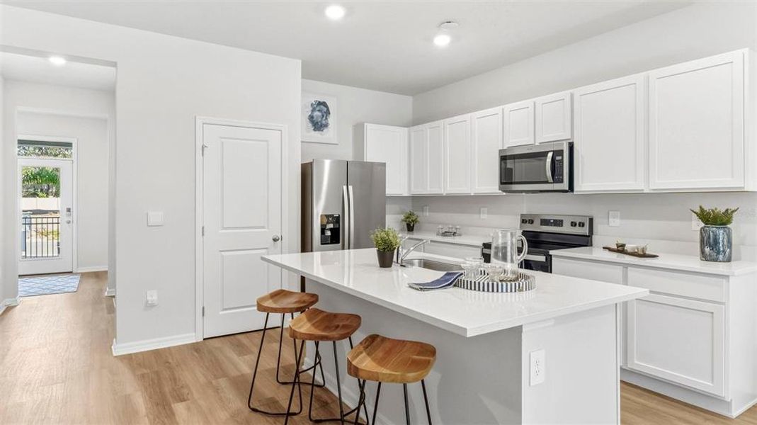 Furnished interior view inside a new home in Oasis at Longwood Run, Sarasota (Image 7).