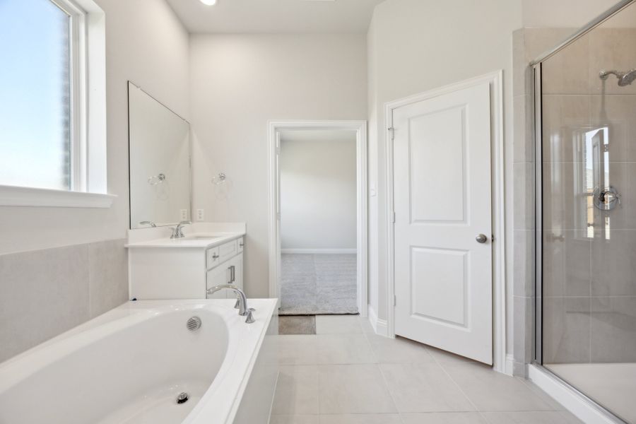 Representative furnished interior of a home built from the Waverly III by Megatel Homes in Bellagio, Forney (Image 8).