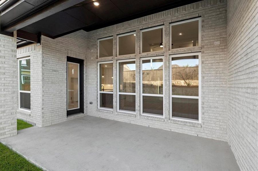 Exterior details and patio area of a home in Wellspring Estates, McKinney (Image 2). Exterior details and patio area of a home in Wellspring Estates, McKinney (Image 2).