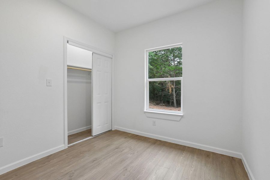 Spacious, unfurnished interior of a new home in , Bastrop (Image 13).