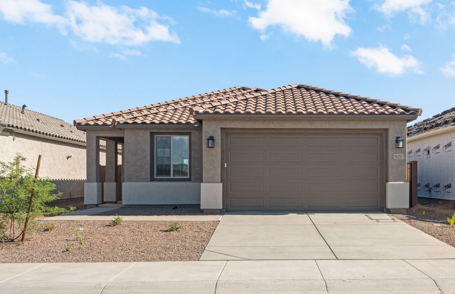 Front exterior of a new home in Visara, Surprise, AZ, highlighting curb appeal (Image 20).