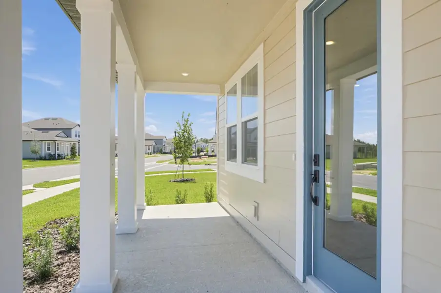 Exterior details and patio area of a home in Trailside, Mount Dora (Image 3).