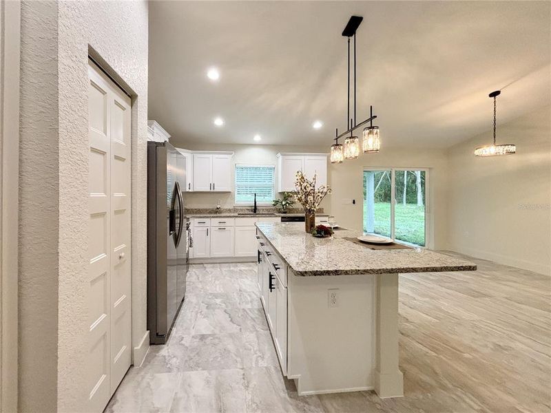 Furnished interior view inside a new home in , Dunnellon (Image 12).