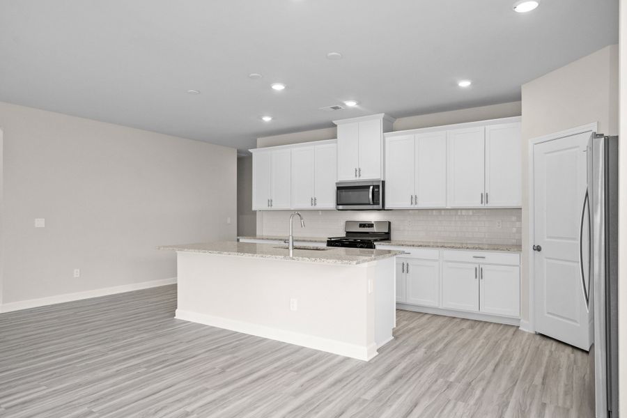 Furnished interior view inside a new home in Cypress Ridge - The Coastline Series, Longs (Image 4).