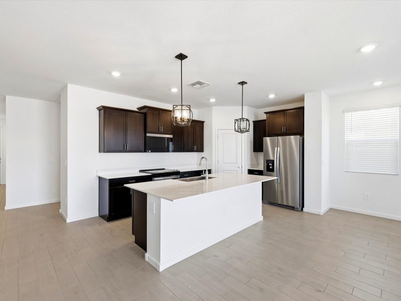 Furnished interior view inside a new home in Meritage Homes by Teravalis - Estate Series, Buckeye (Image 4).