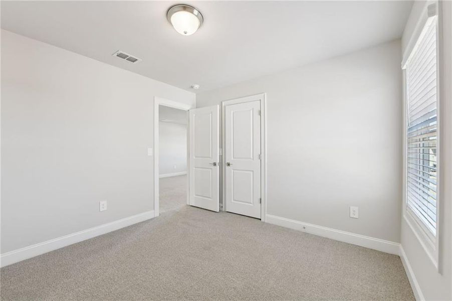 Spacious, unfurnished interior of a new home in River Pointe, Monroe (Image 39).