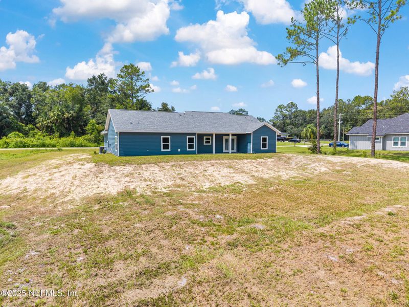Front exterior of a new home in , Hampton, FL, highlighting curb appeal (Image 21).