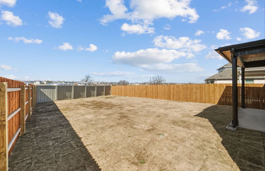 Exterior details and patio area of a home in Santa Rita Ranch, Liberty Hill (Image 28).