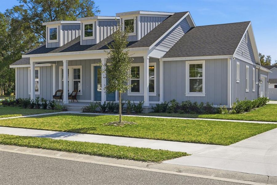 Front exterior of a new home in , Lake Helen, FL, highlighting curb appeal (Image 30).