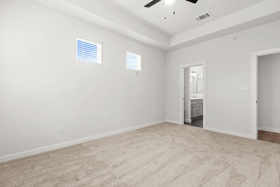A spacious chamber provides an airy, open feeling, with access to an en-suite bath. A spacious chamber provides an airy, open feeling, with access to an en-suite bath.