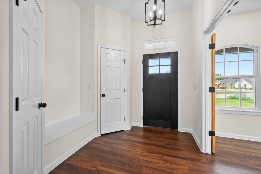 Front entry way with sitting area Front entry way with sitting area