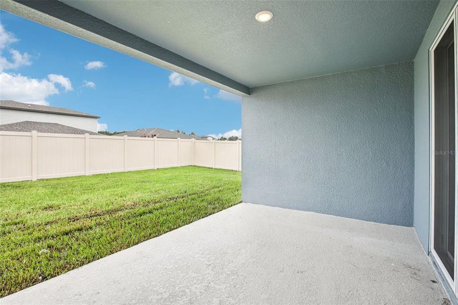Exterior details and patio area of a home in Two Rivers - Signature Series, Zephyrhills (Image 2).