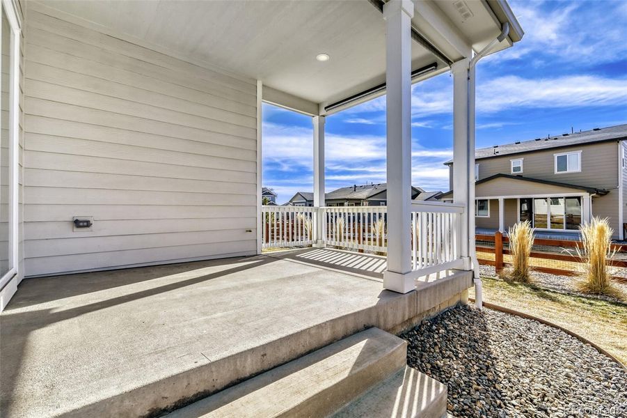 Exterior details and patio area of a home in Creekside Village, Thornton (Image 4).