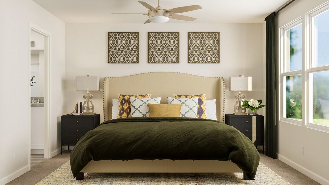 A bedroom with a large bed.