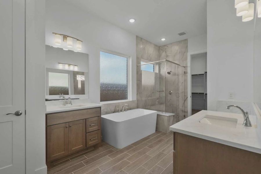 Representative furnished interior of a home built from the Sorenstam by Chesmar Homes in Riceland Alley Loads, Mont Belvieu (Image 10).