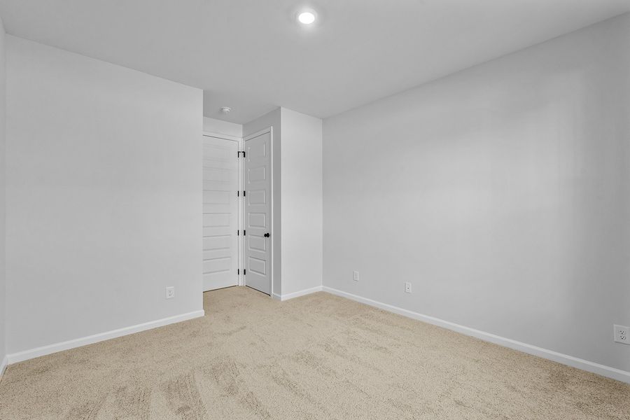 Spacious, unfurnished interior of a new home in Lilah Grove, Summerfield (Image 30).