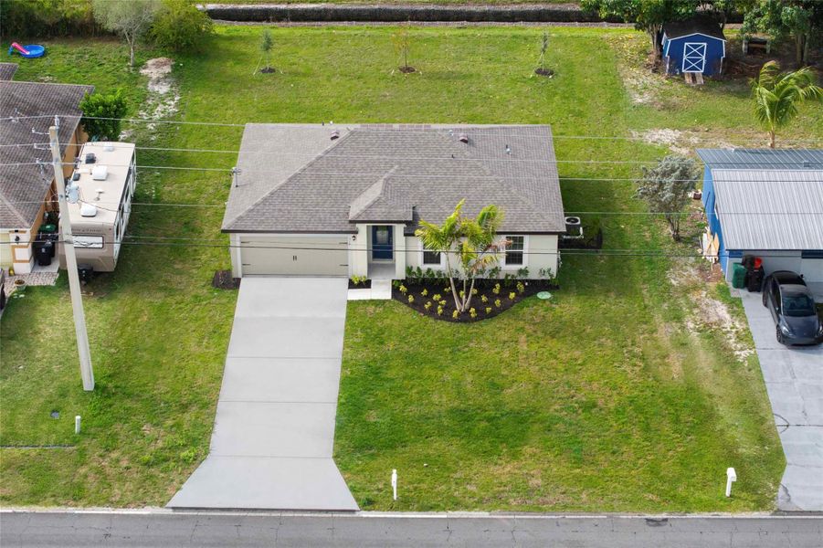 Front exterior of a new home in , Port St. Lucie, FL, highlighting curb appeal (Image 14).