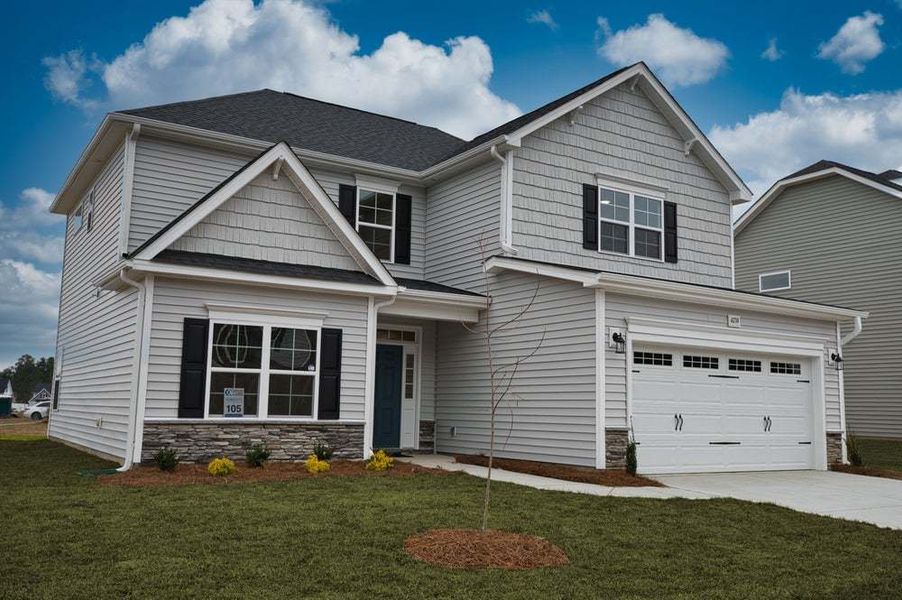 Representative exterior photo of a completed home built from the Aberdeen by Caviness & Cates Communities in Bartlett Manor, Youngsville, NC (Image 11).