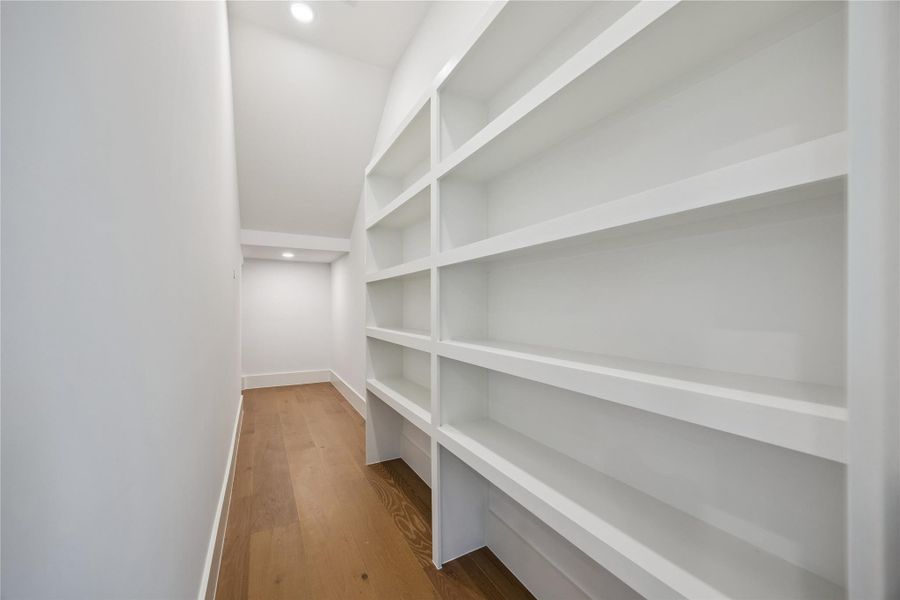 Open shelving and generous storage create a pantry space that feels both practical and visually connected to the kitchen design. Built-in organization helps maximize functionality without sacrificing accessibility. Open shelving and generous storage create a pantry space that feels both practical and visually connected to the kitchen design. Built-in organization helps maximize functionality without sacrificing accessibility.