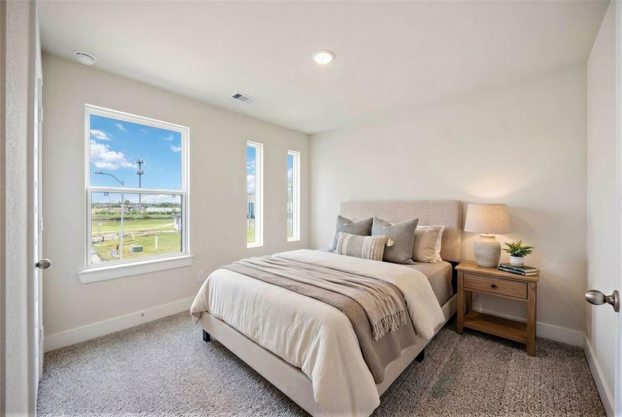 Virtually staged representation of the Secondary Bedroom.