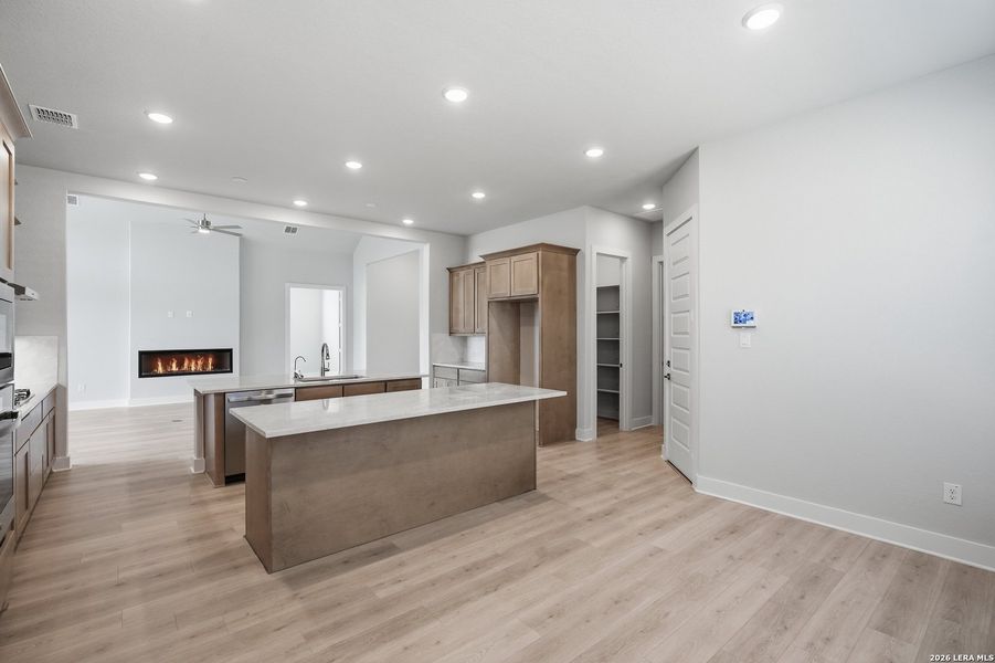Furnished interior view inside a new home in Potranco Oaks, Castroville (Image 10).