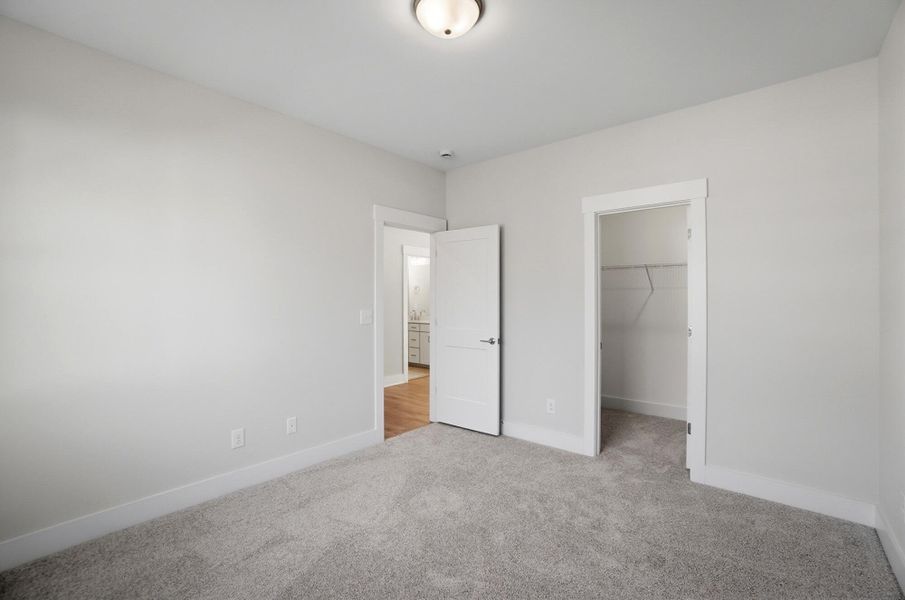 Spacious, unfurnished interior of a new home in Rone Creek, Waxhaw (Image 75).