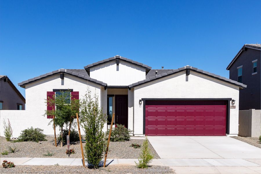 Front exterior of a new home in Rancho Santa Rosa, Maricopa, AZ, highlighting curb appeal (Image 1). Front exterior of a new home in Rancho Santa Rosa, Maricopa, AZ, highlighting curb appeal (Image 1).