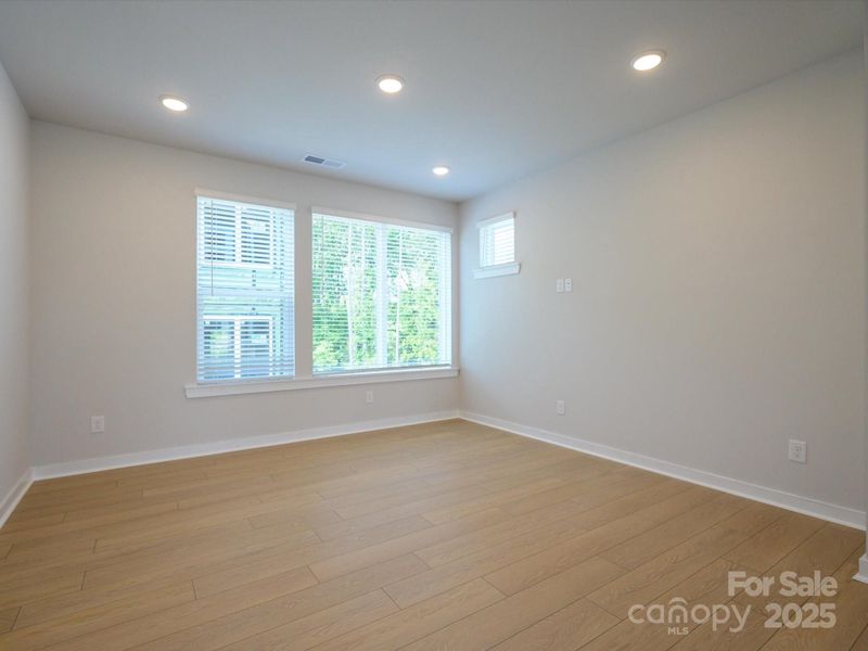 Spacious, unfurnished interior of a new home in Central Living at Craig, Charlotte (Image 16).