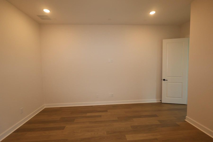 Spacious, unfurnished interior of a new home in Harvest Green - Parkview Collection, Richmond (Image 13). Spacious, unfurnished interior of a new home in Harvest Green - Parkview Collection, Richmond (Image 13).