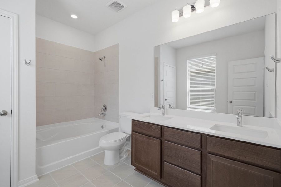 Furnished interior view inside a new home in Mustang Ridge, Magnolia (Image 8).