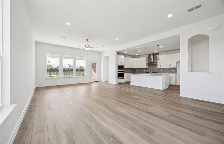 Airy gathering room showcases open concept floorplan Airy gathering room showcases open concept floorplan