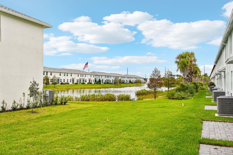 Front exterior of a new home in Tidewater, Fort Pierce, FL, highlighting curb appeal (Image 20). Front exterior of a new home in Tidewater, Fort Pierce, FL, highlighting curb appeal (Image 20).