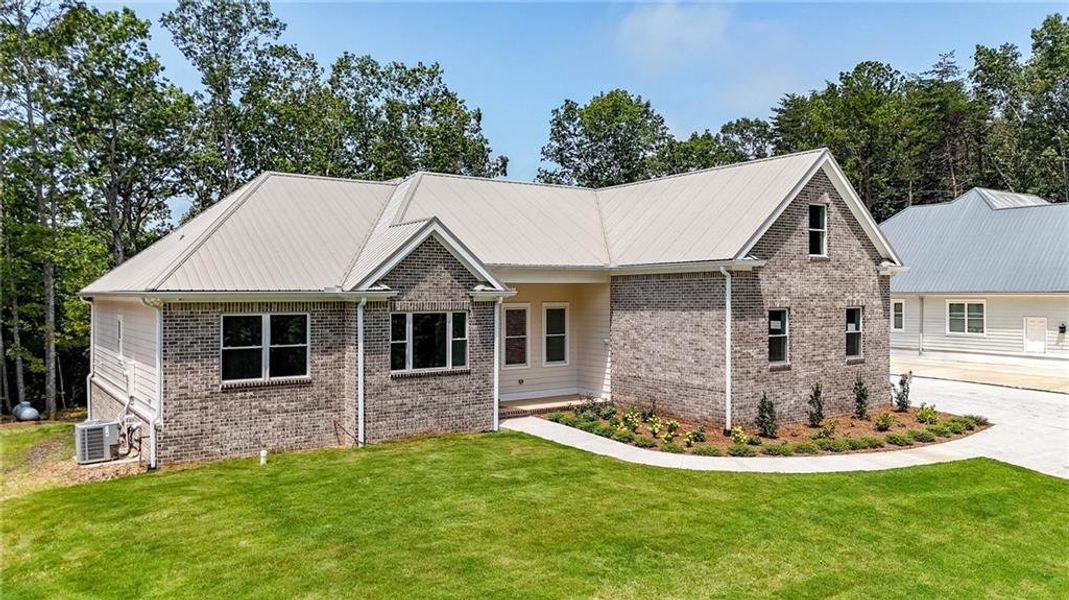 Front exterior of a new home in , Canton, GA, highlighting curb appeal (Image 26).