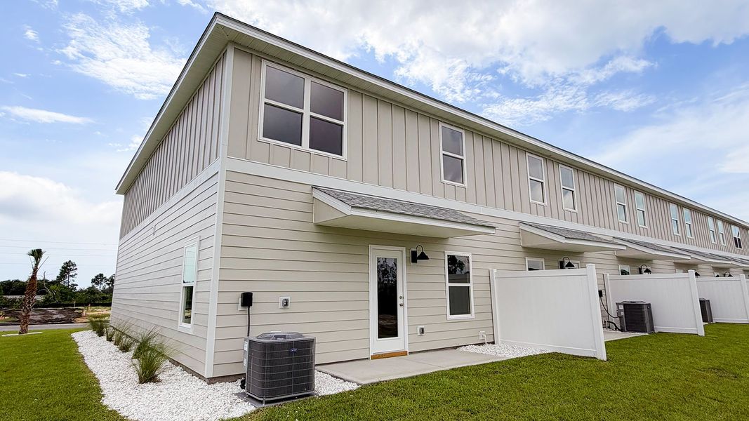 Exterior details and patio area of a home in WindMark Beach, Port Saint Joe (Image 4).