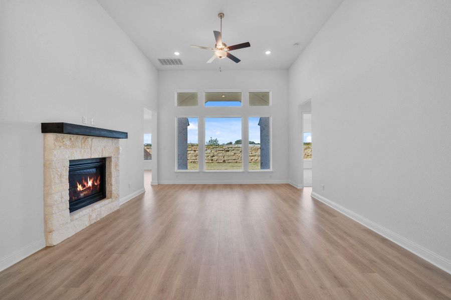 Family Room with high ceiling & fireplace