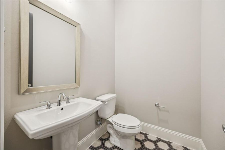 Half bath with designer tile.