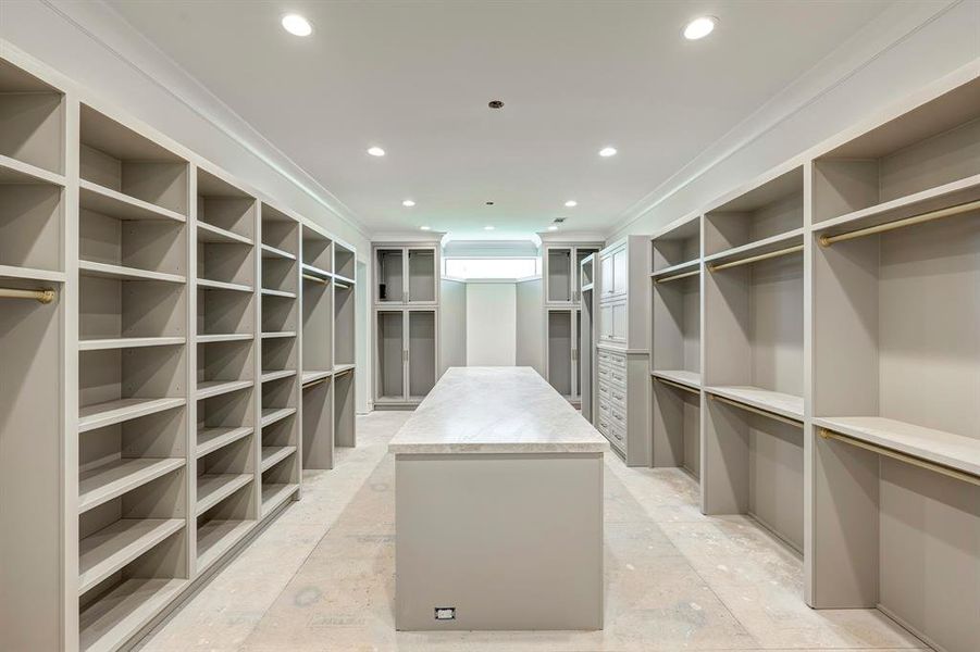 Her closet as of April 17, 2025. Three-way mirror to be installed beyond island. Her closet as of April 17, 2025. Three-way mirror to be installed beyond island.