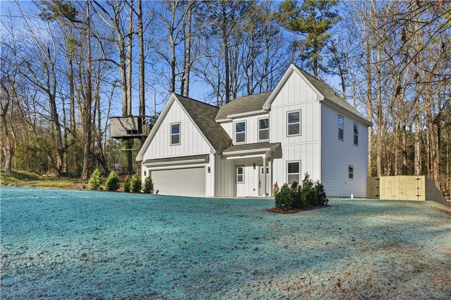 Front exterior of a new home in , Acworth, GA, highlighting curb appeal (Image 24). Front exterior of a new home in , Acworth, GA, highlighting curb appeal (Image 24).