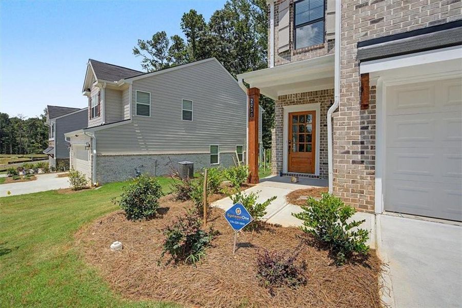 Exterior details and patio area of a home in Sawmill Creek, Austell (Image 29).