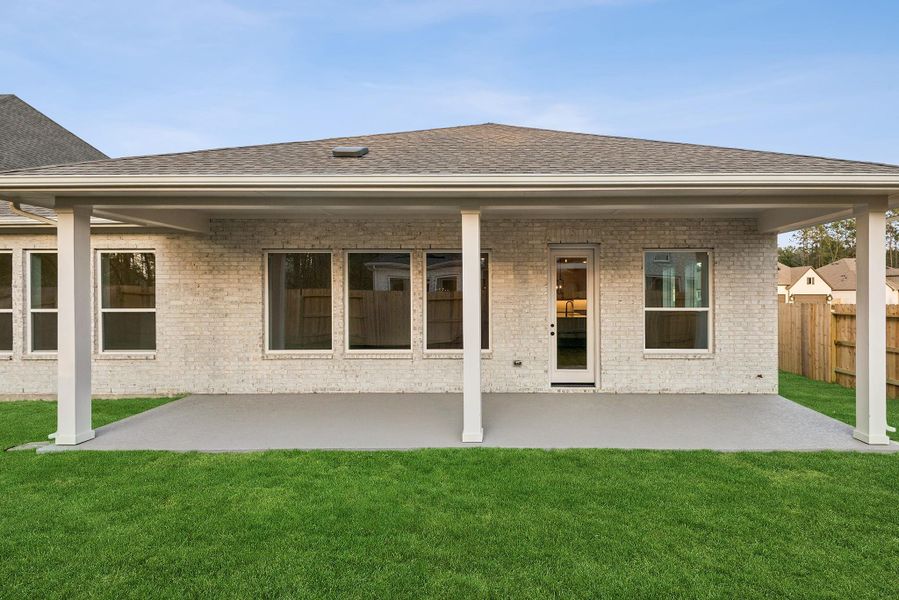 Exterior details and patio area of a home in ARTAVIA 65' Homesites, Conroe (Image 3). Exterior details and patio area of a home in ARTAVIA 65' Homesites, Conroe (Image 3).