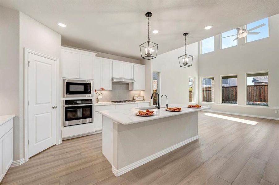 Furnished interior view inside a new home in Lily Creek at Sutton Fields, Aubrey (Image 17).