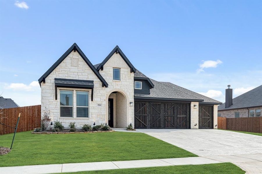 Front exterior of a new home in Sunrise at Garden Valley, Waxahachie, TX, highlighting curb appeal (Image 23).
