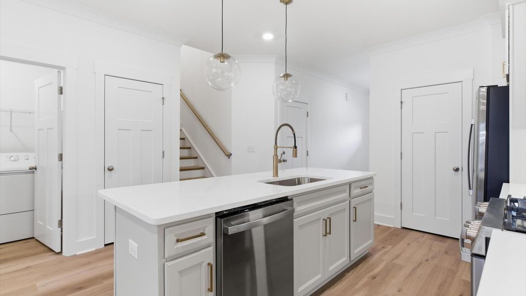Accomplished layout with a first-class kitchen in this select community by DRB Homes