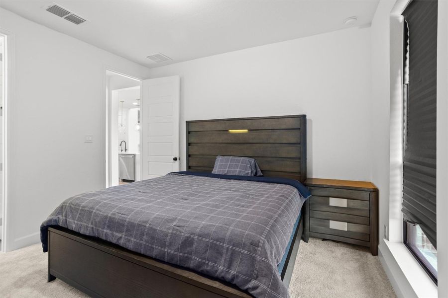 Comfortable guest bedroom with en-suite access