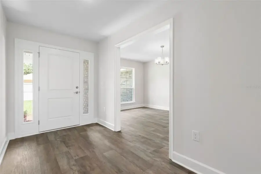 Representative unfurnished interior of a home built from the 2117 by Adams Homes in Flagler Estates, Hastings (Image 21).