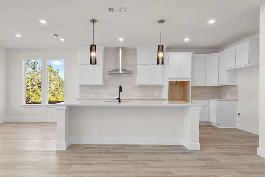 Furnished interior view inside a new home in Bridgeland, Cypress (Image 6).
