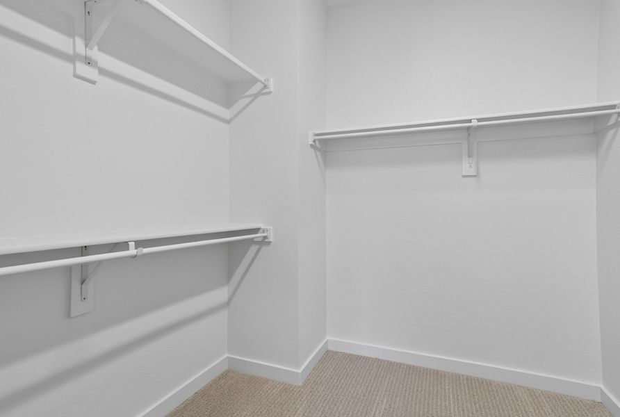 Spacious, unfurnished interior of a new home in The Tribute, The Colony (Image 40).